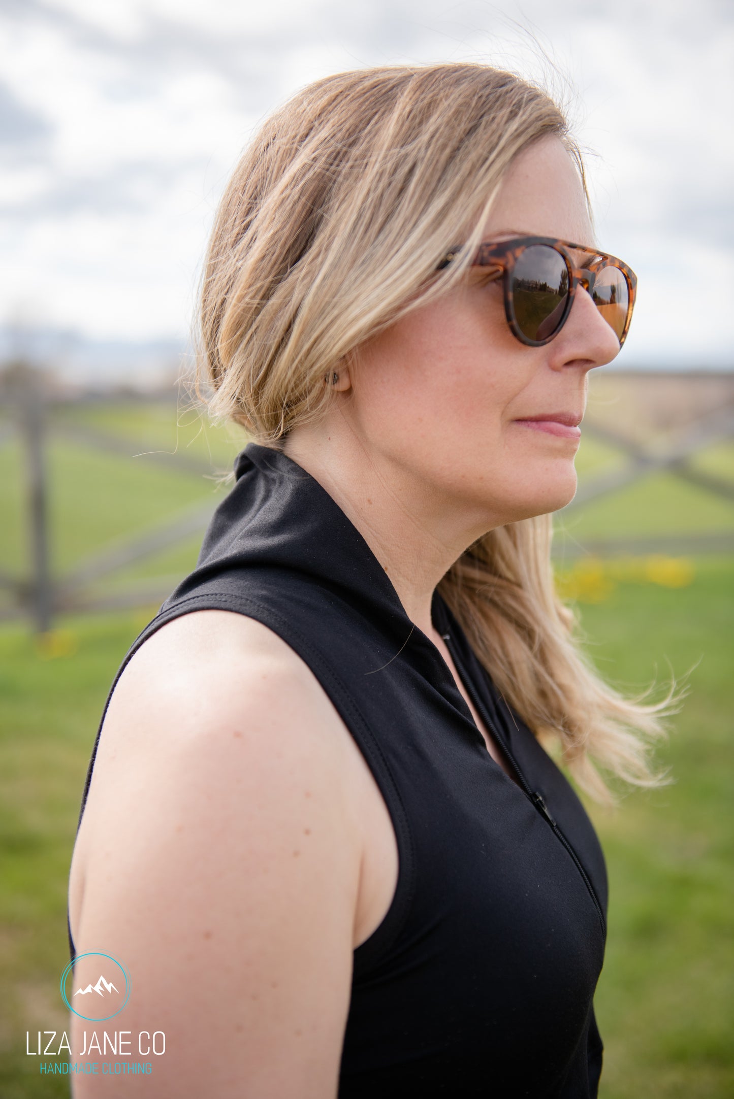 Black 3/4 zip Women's Golf Shirt - Sleeveless