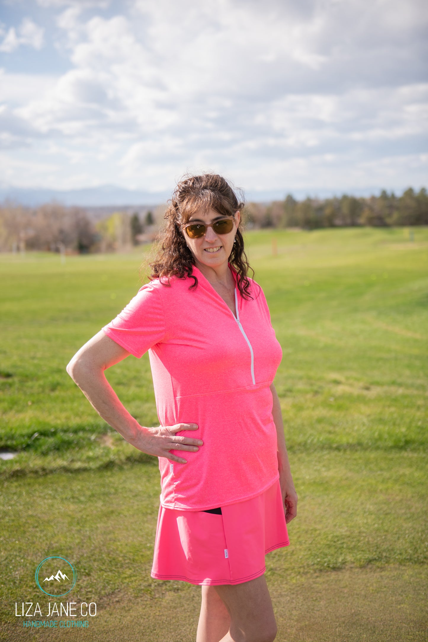 Hot Pink 3/4 zip Women's Golf Shirt - Short sleeve