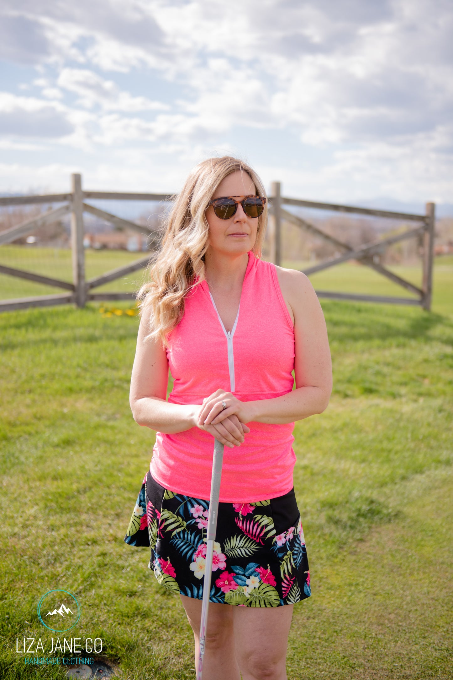 Hot Pink 3/4 zip Women's Golf Shirt - Sleeveless